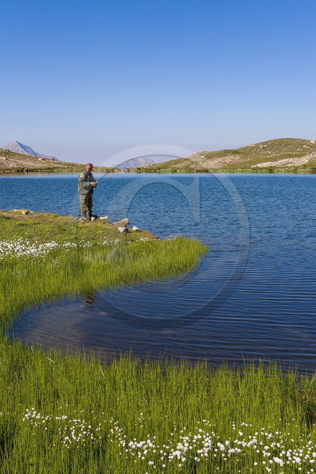 Orcières 1850, pêcheurau lac Jumeaux
